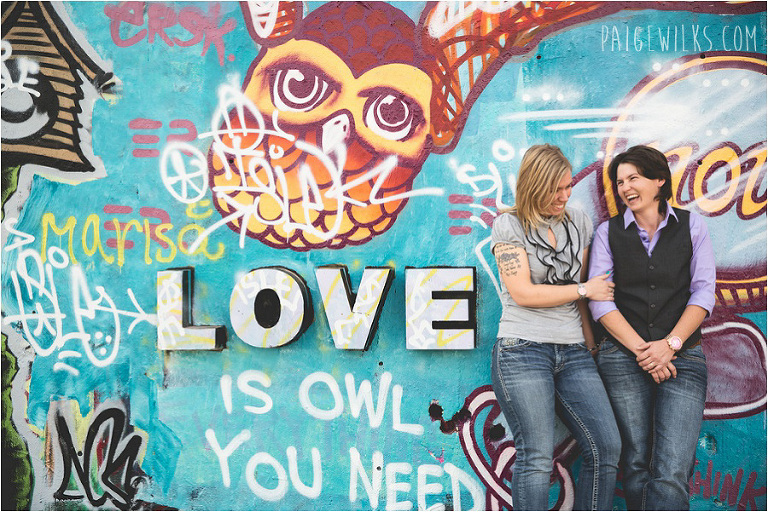 lesbian couple in front of LOVE sign austin texas